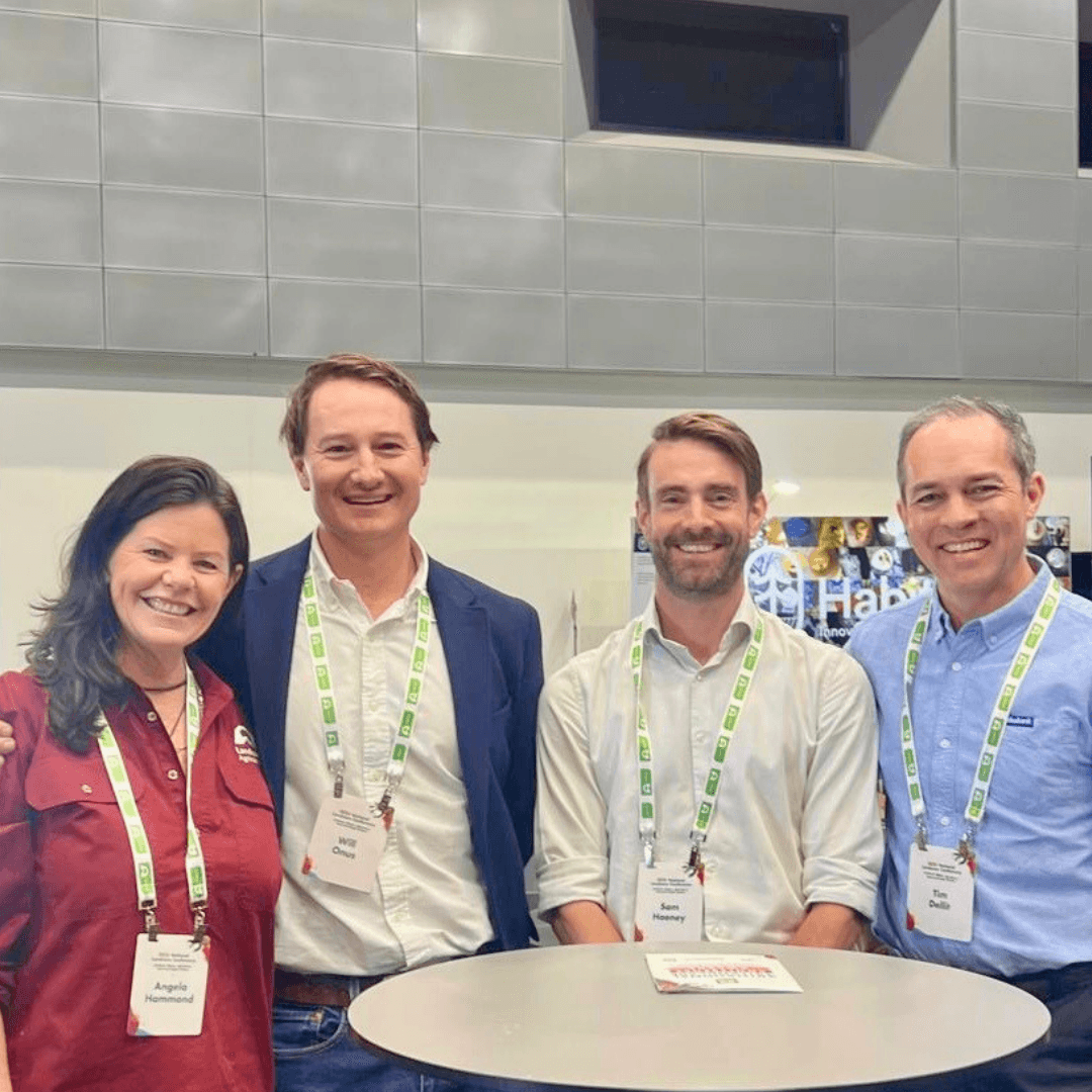 Ruminati COO Will Onus and Landcare Farming Program Manager Ang Hammond with Rabobank representatives at the National Landcare Conference 2025.