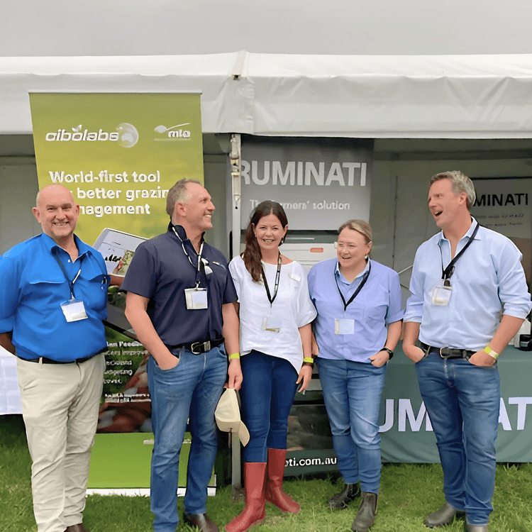 Ruminati co-founder Bobby Miller jokes with Mick Taylor, Phil Tickle, Ang Hammond and Merri King at the Wilmot Field Day.