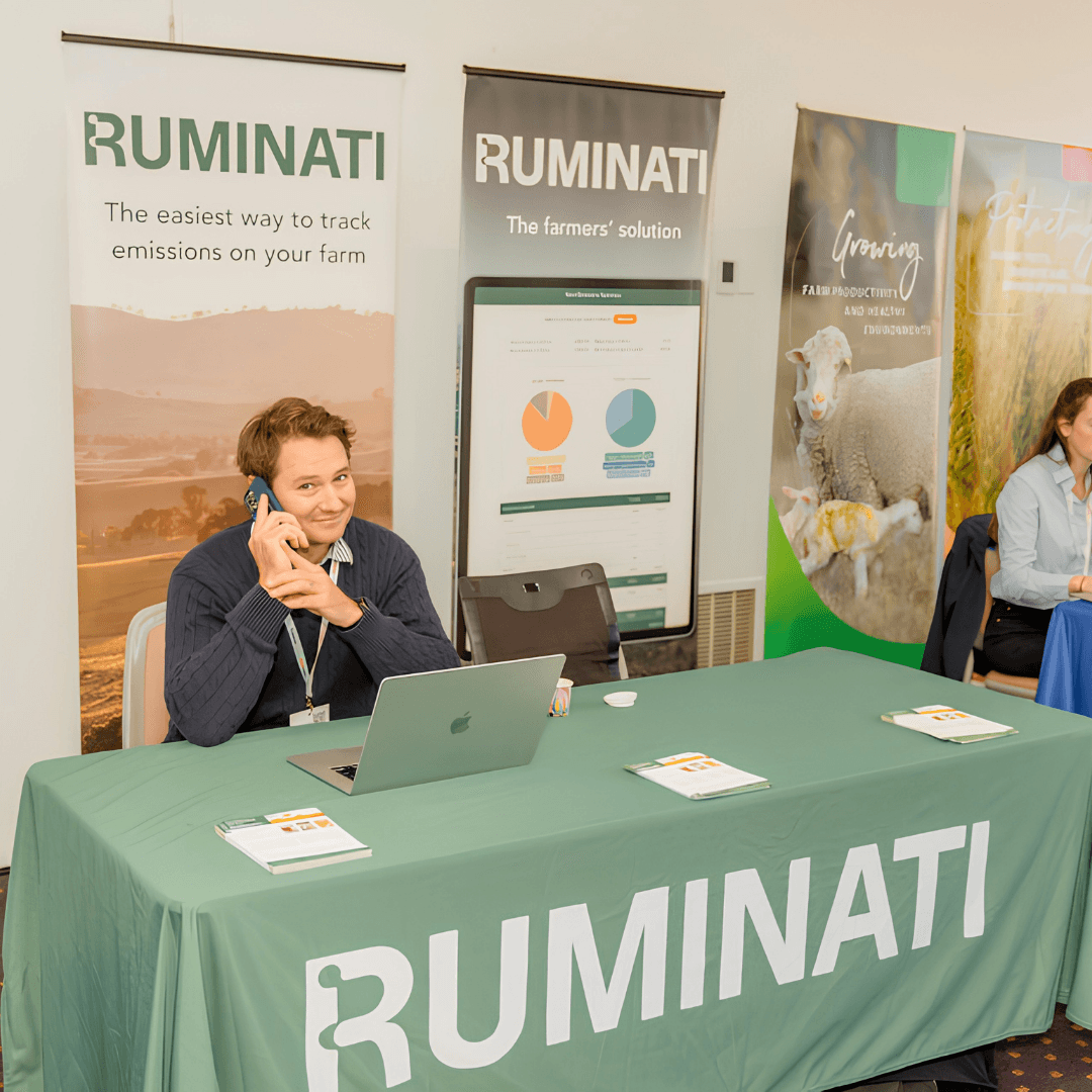 Ruminati COO Will Onus takes a call at the Digital Agrifood Summit in 2023.